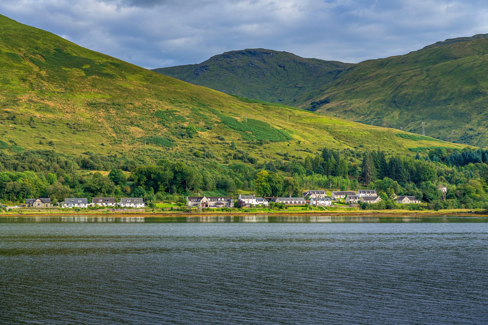 Village Lines On The Shore Of A Sea Loch
